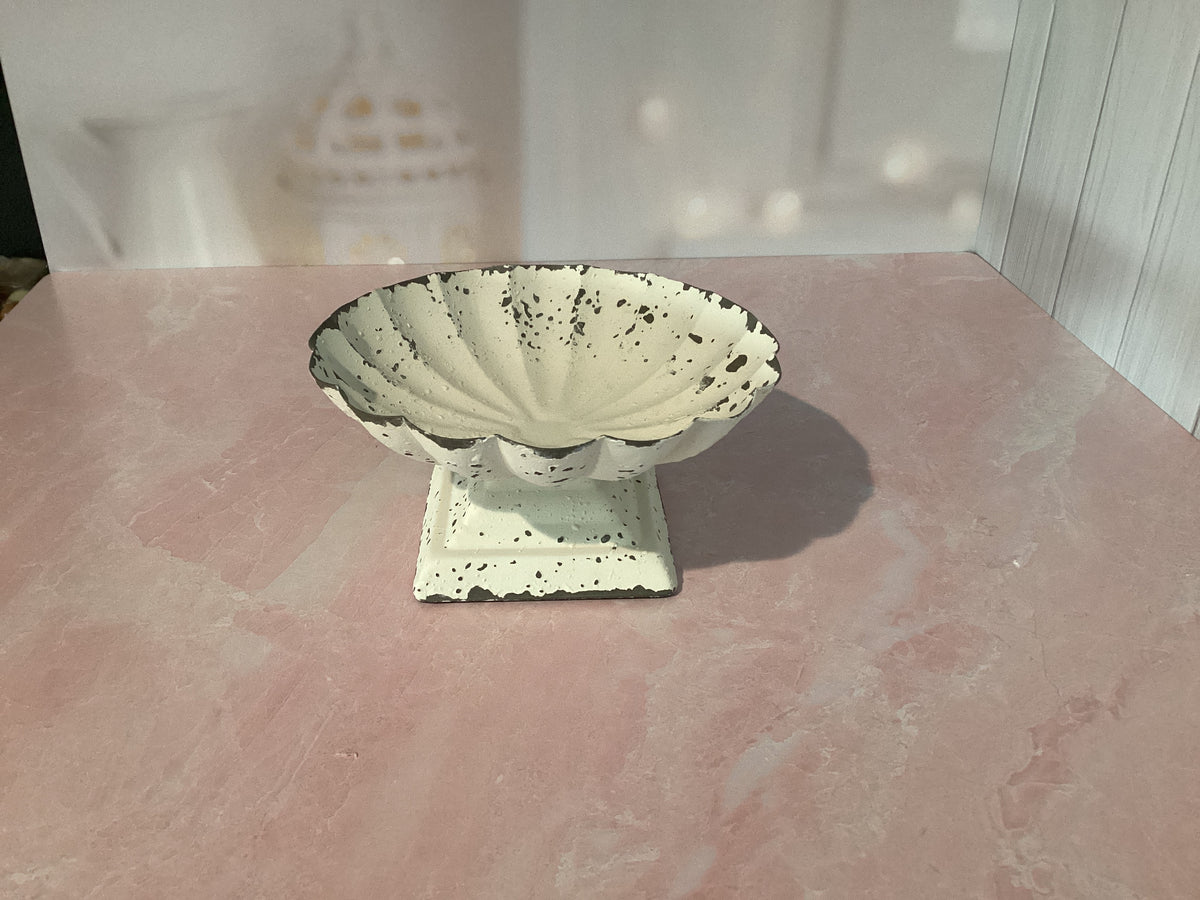 Small white pedestal
